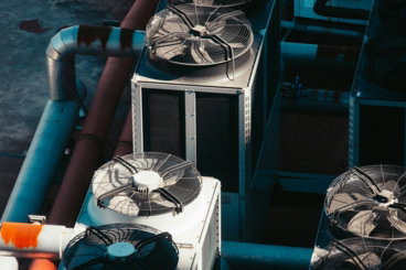 a group of air conditioners sitting next to each other